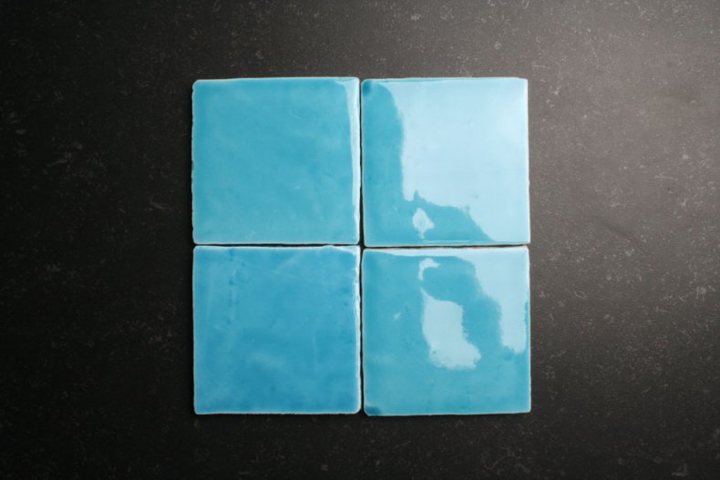 Handvorm 10x10 licht blauwe tegels